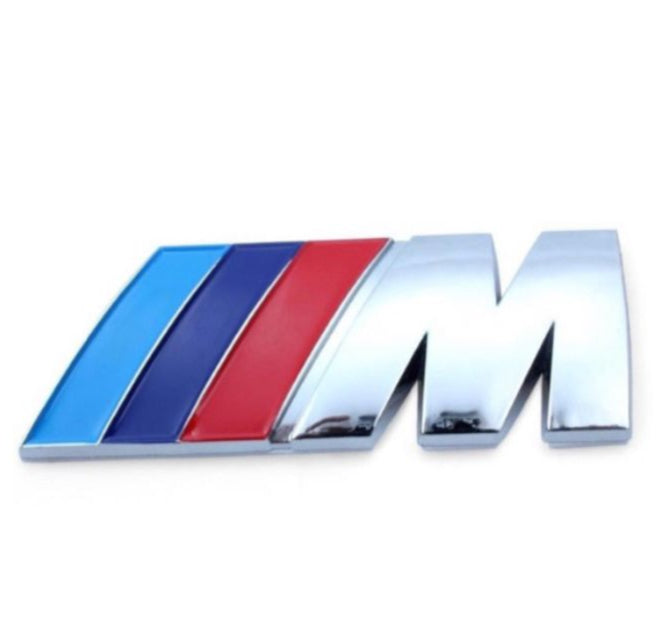 M silver trunk emblem