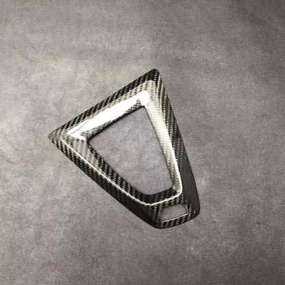 Carbon fiber trim for M DCT transmissions