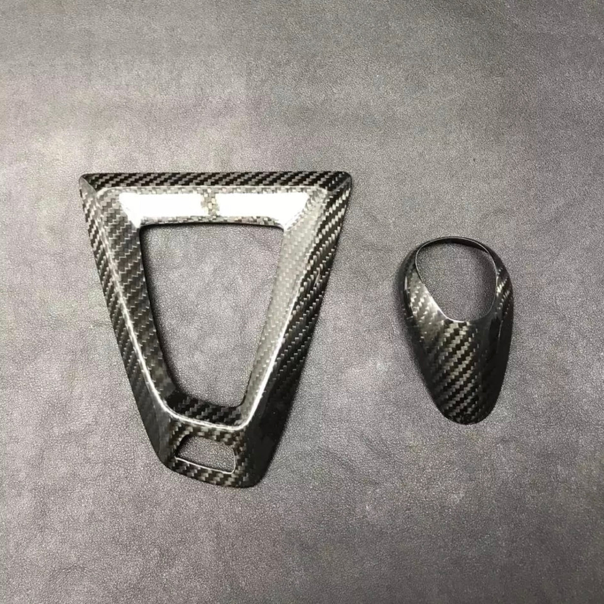 Carbon fiber trim for M DCT transmissions