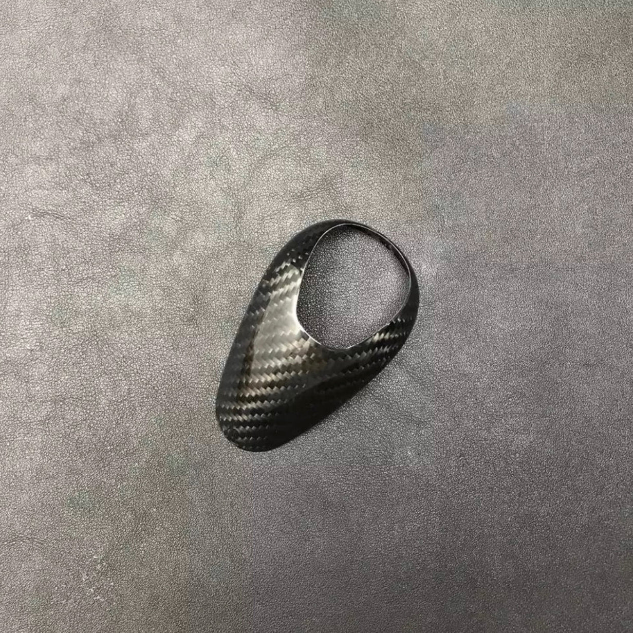 Carbon fiber trim for M DCT transmissions