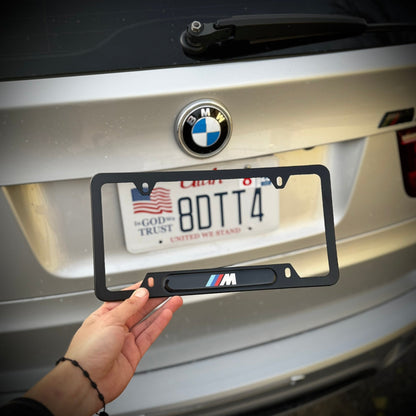 BMW OEM M LOGO LICENSE PLATE FRAME IN POLISHED STAINLESS STEEL BMW OEM M LOGO LICENSE PLATE FRAME IN POLISHED STAINLESS STEEL